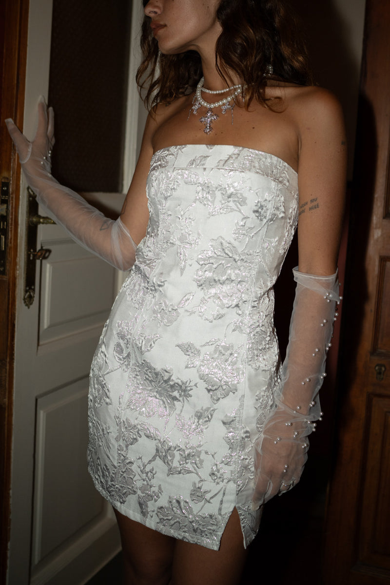 Bellini Silver Strapless Floral Mini Dress paired with complementary accessories for a polished look.