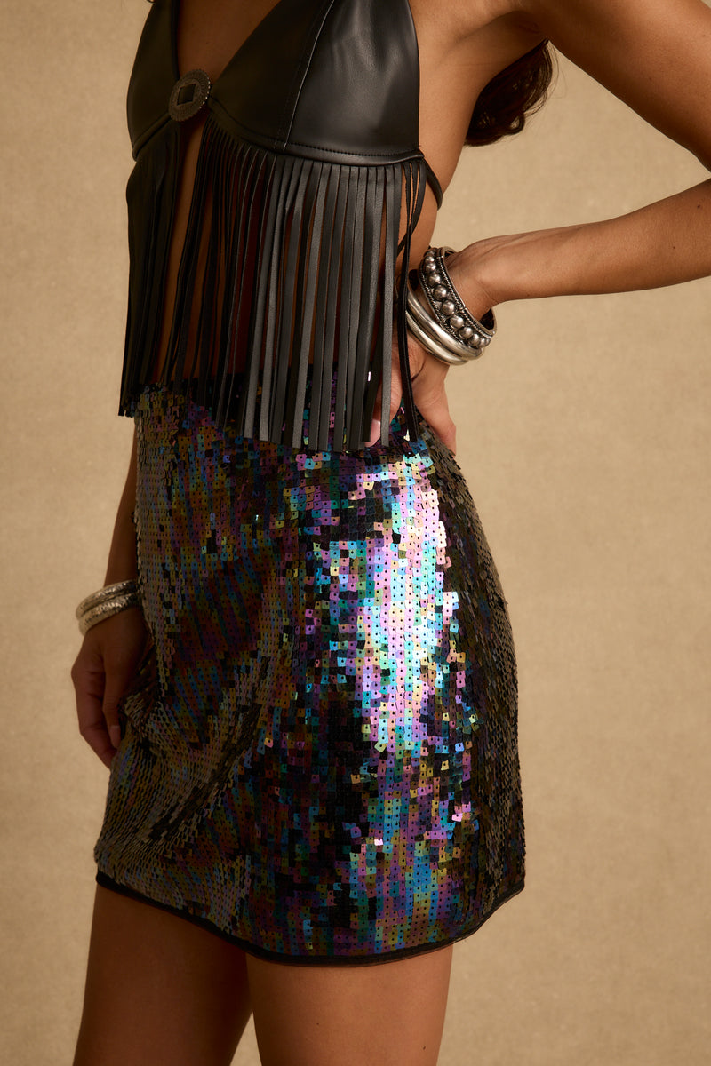 Ari Purple Sequin Mini Skirt styled in a complete look from an alternate angle.