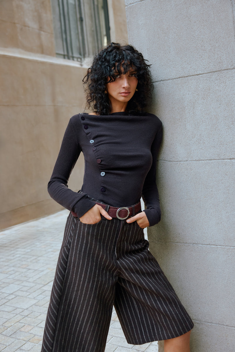 Asymmetrical buttoned top