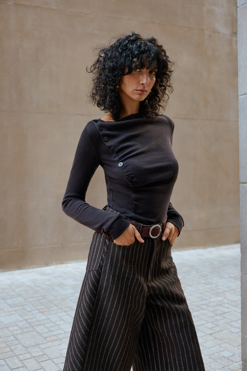 Asymmetrical buttoned top
