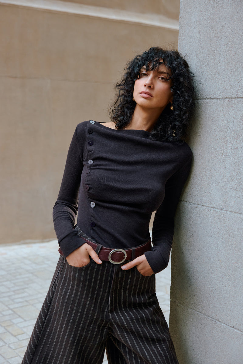Asymmetrical buttoned top