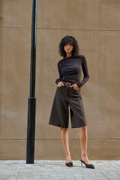 Asymmetrical buttoned top
