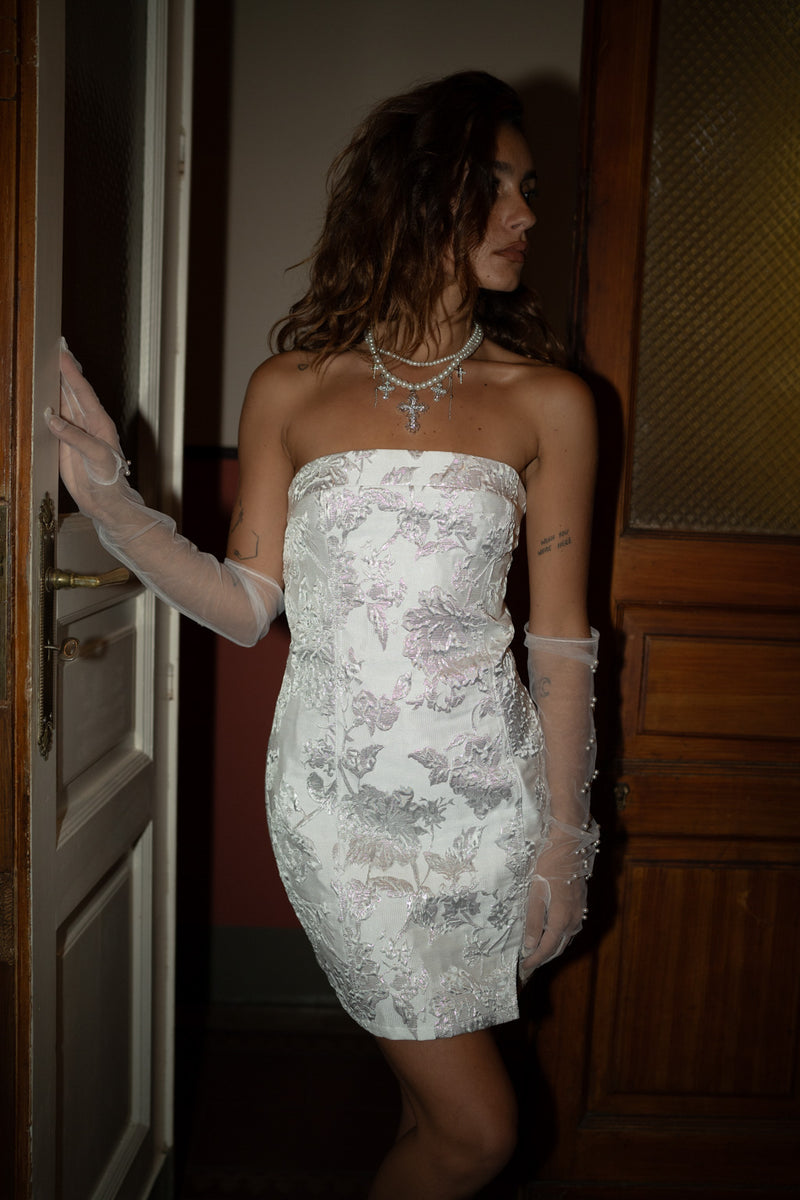 Bellini Silver Strapless Floral Mini Dress styled in a complete look from an alternate angle.