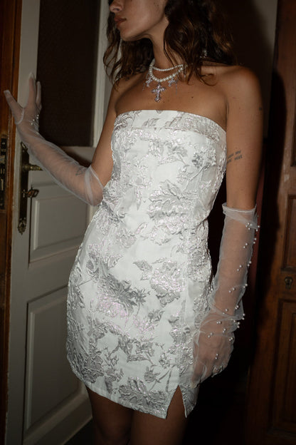 Bellini Silver Strapless Floral Mini Dress paired with complementary accessories for a polished look.