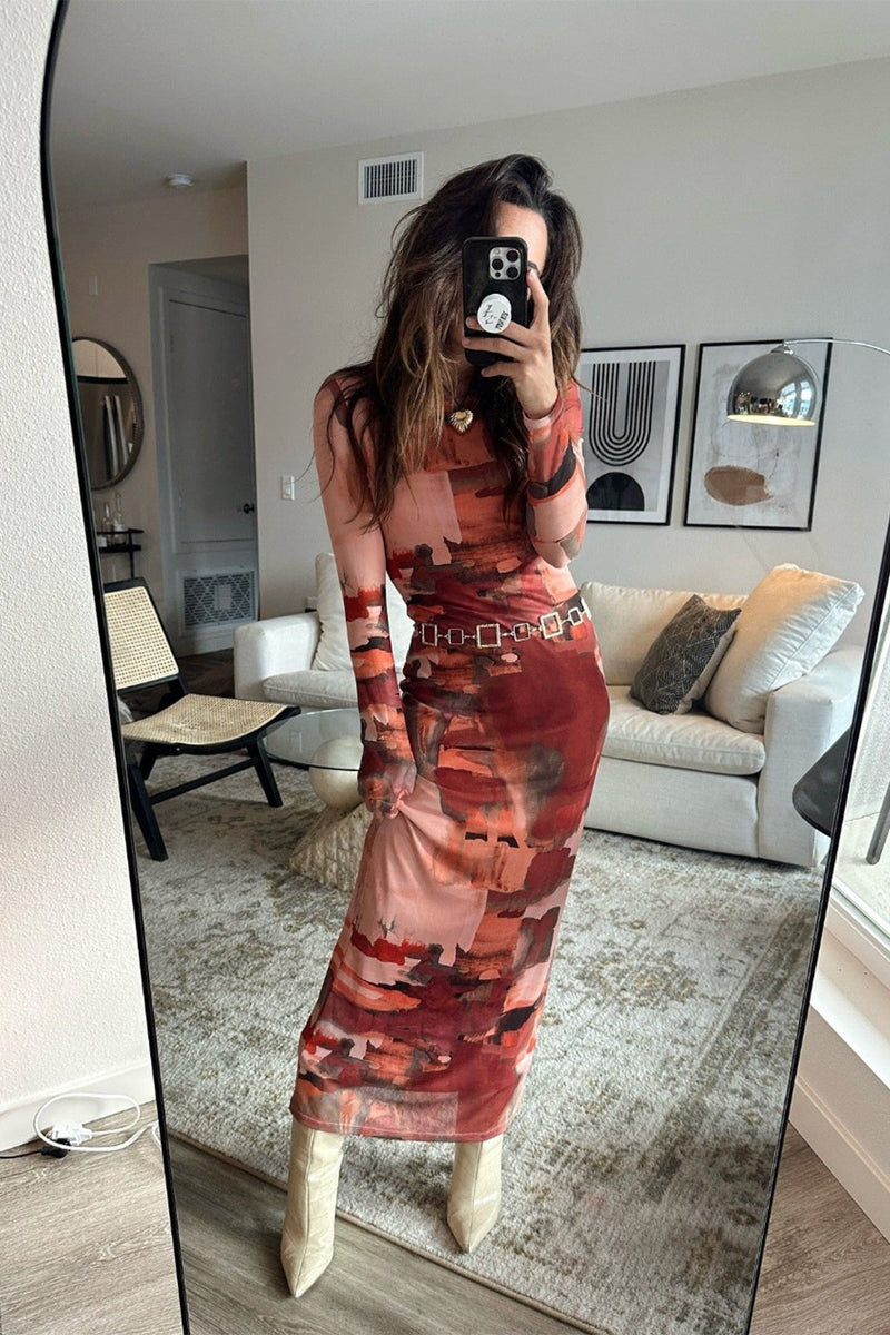 Mesh maxi dress with detailing and a flattering silhouette.