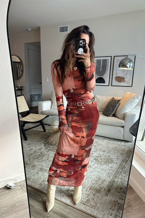Mesh maxi dress with detailing and a flattering silhouette.