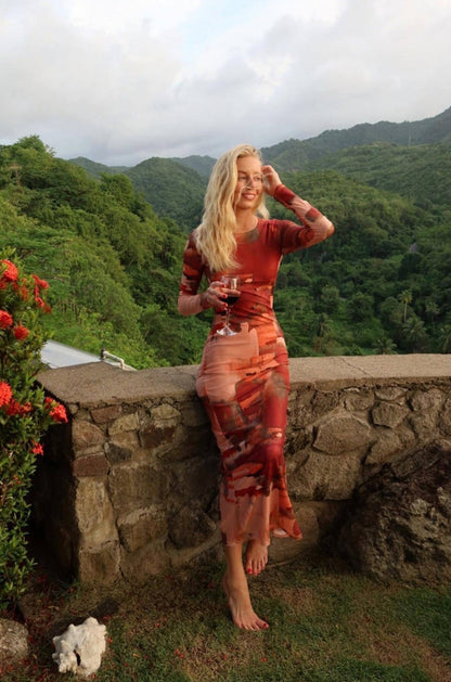 Back view of the mesh maxi dress showing the silhouette and fit.