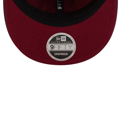 Pictured is this MLB Flourishes Chicago White Sox Retro Crown 9FIFTY cap in dark purple. 7