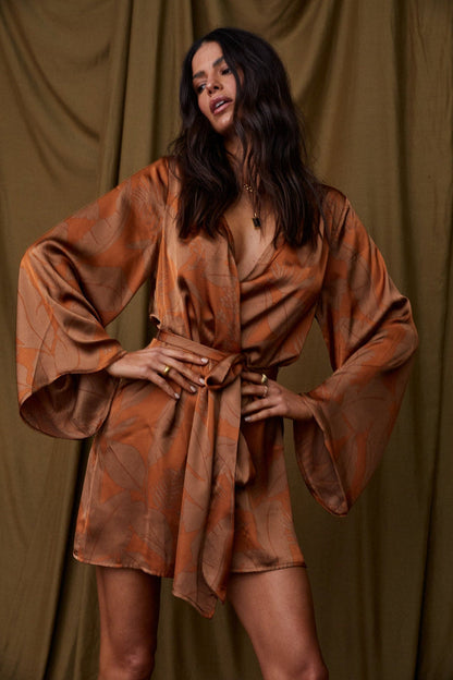 Back view of the rust dress showing the silhouette and fit.