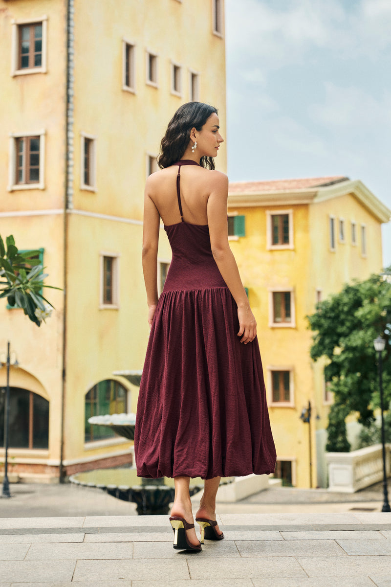 Halterneck pleated bubble hem dress