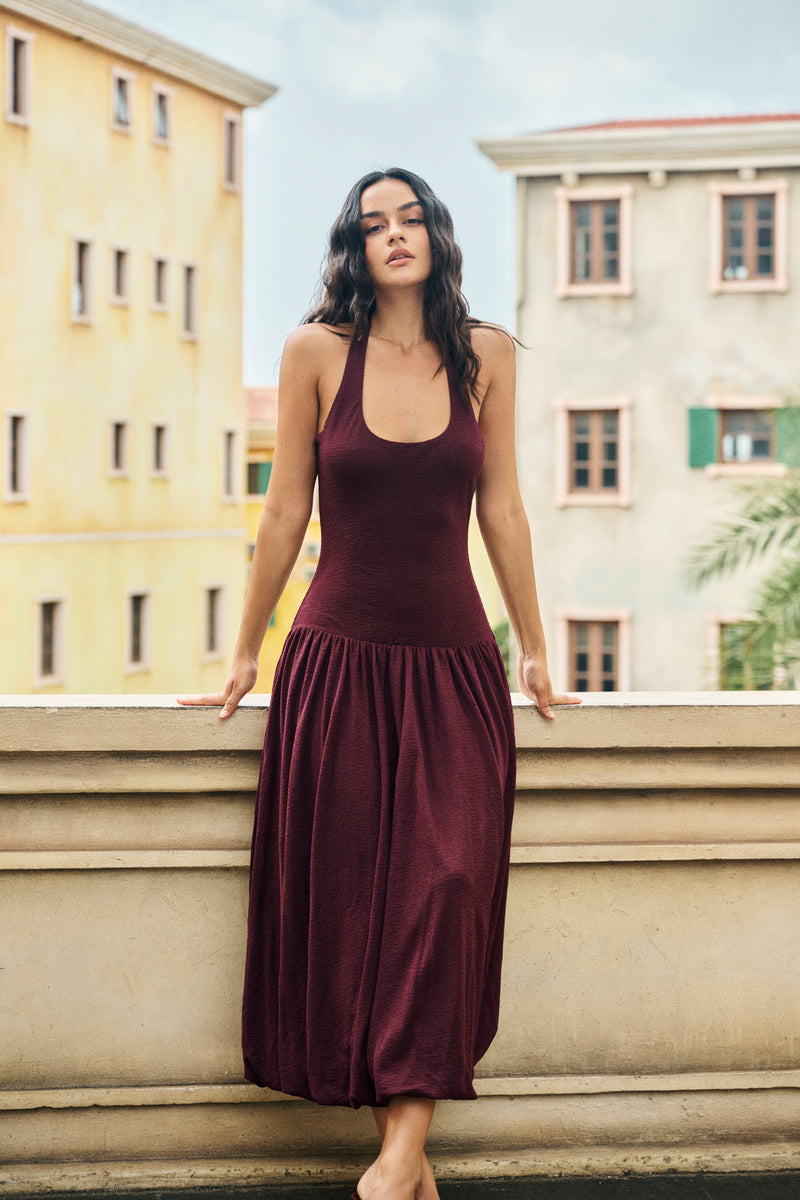 Halterneck pleated bubble hem dress