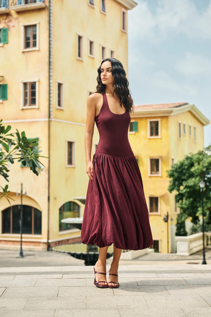Halterneck pleated bubble hem dress
