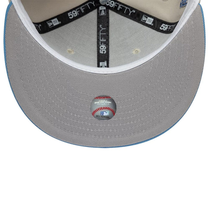 Pictured is this MLB Cooperstown Houston Astros 59FIFTY Fitted cap in beige & blue. 2