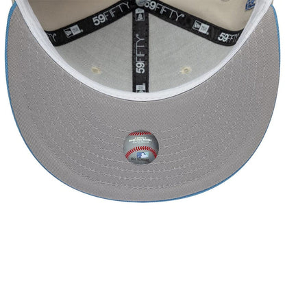 Pictured is this MLB Cooperstown Houston Astros 59FIFTY Fitted cap in beige & blue. 2