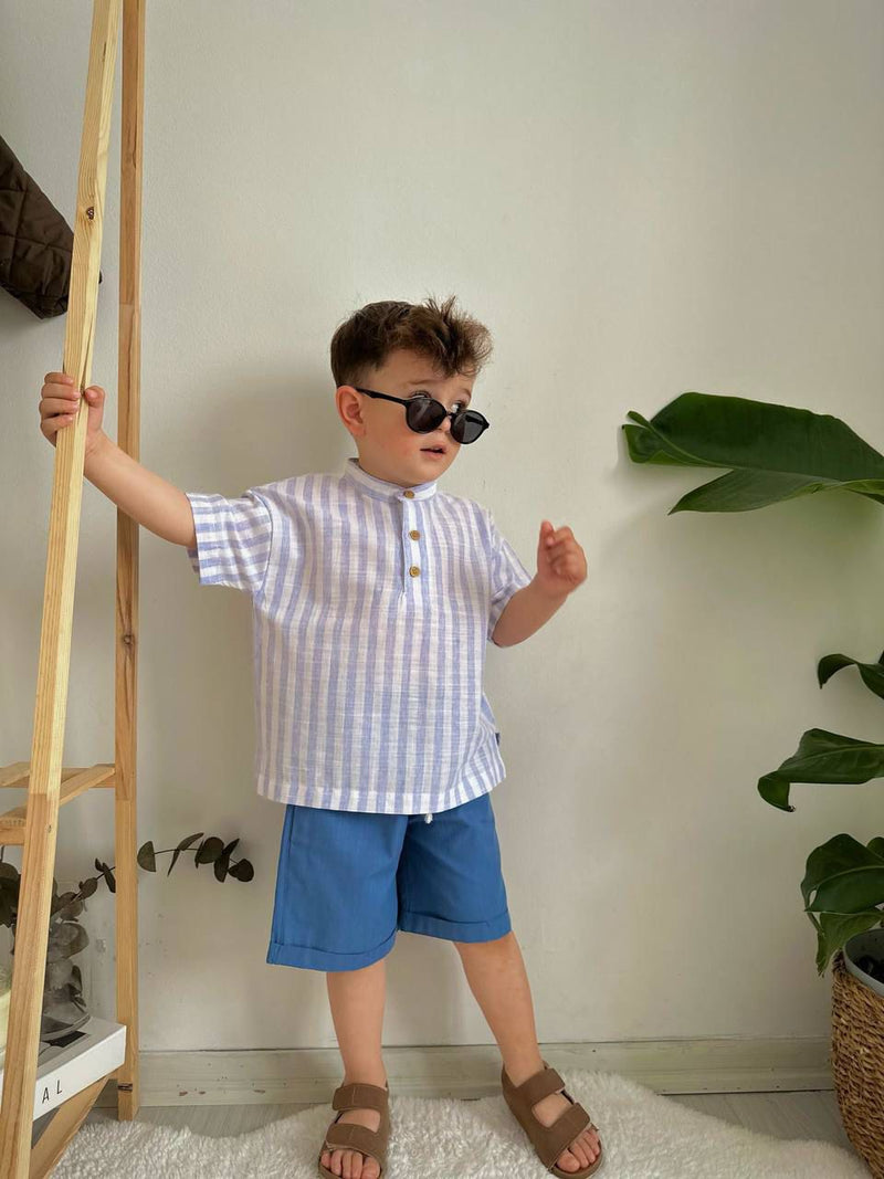 KOSTUM ME BLUZE ME VIJA DHE TUTA TE SHKURTRA