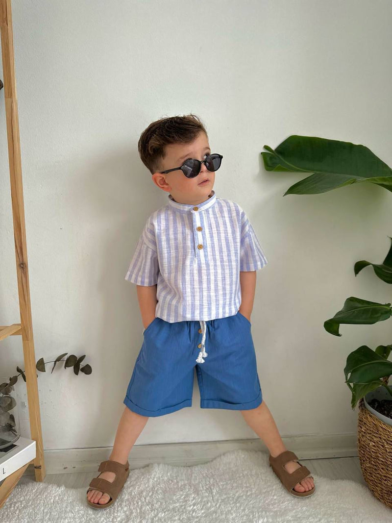 KOSTUM ME BLUZE ME VIJA DHE TUTA TE SHKURTRA