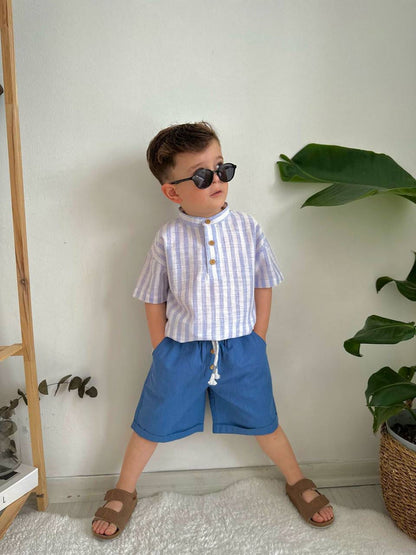 KOSTUM ME BLUZE ME VIJA DHE TUTA TE SHKURTRA