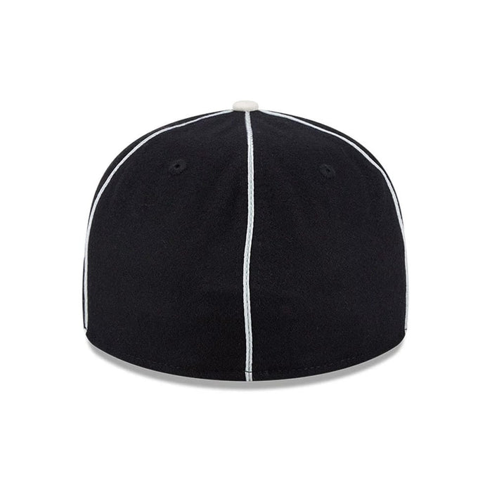 Pictured is this NHL Felt Logo LA Kings Retro Crown 59FIFTY Fitted cap in black. 7