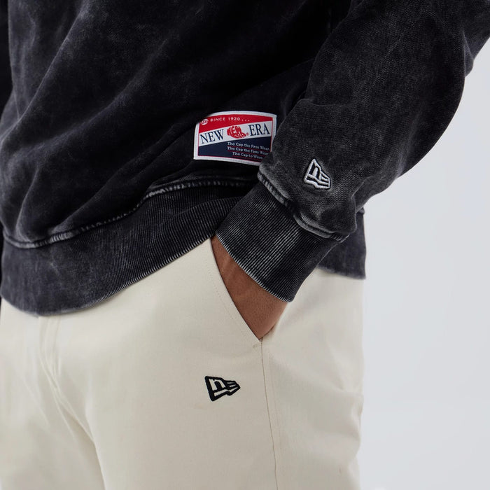 The model is wearing this NFL Las Vegas Raiders Laurel Wreath Crew Neck Sweater in black. 5