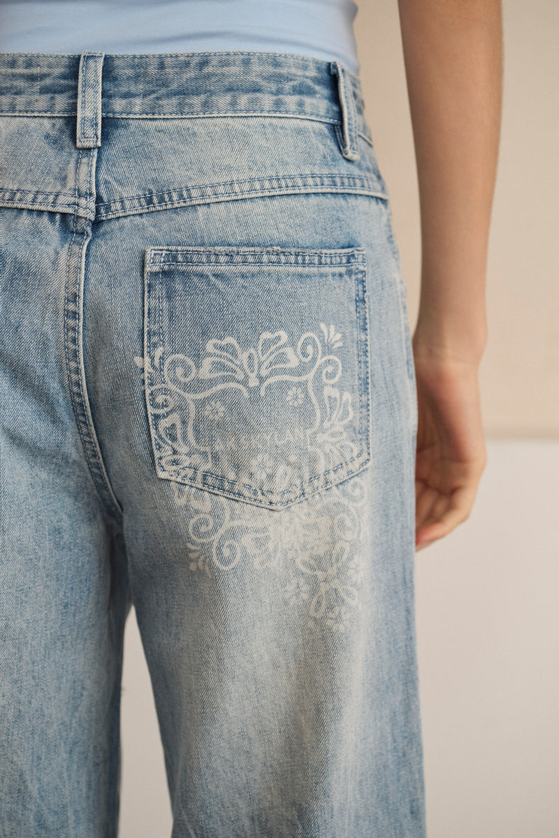 Light wash floral print jeans