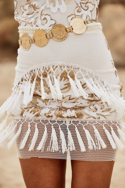 Gold belt with refined detailing and a flattering silhouette.
