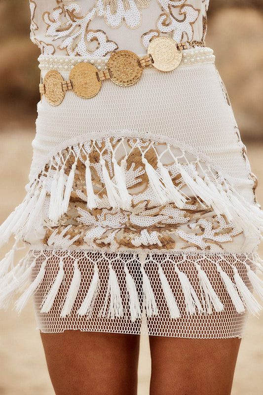 Gold belt with refined detailing and a flattering silhouette.