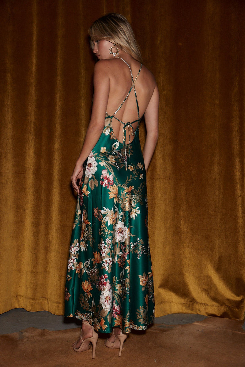 Back view of the emerald maxi dress showing the silhouette and fit.