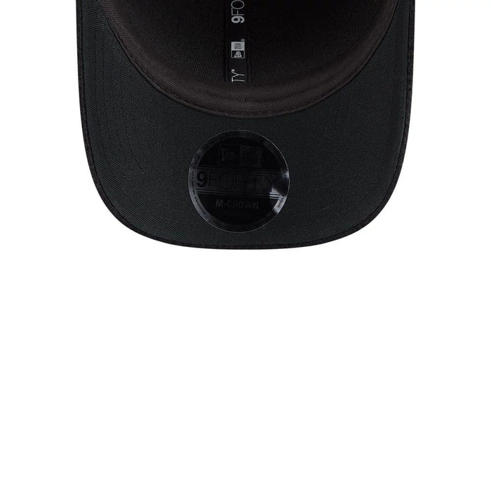 Pictured is this New Era Brushed Fleece 9FORTY M-Crown cap in black. 7