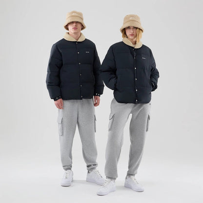 The Male model is wearing  New Era Organic Boa Neck Navy Jacket 1