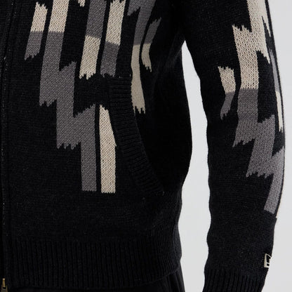 The Male model is wearing  New Era Organic Cowichan Black Cardigan 5