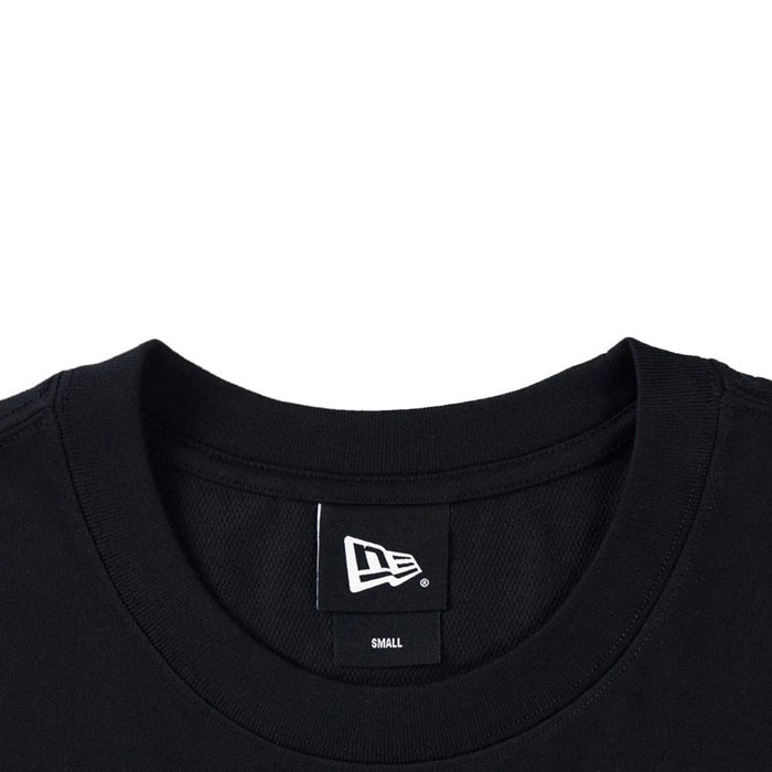 The model is wearing this New Era Skate Is Life Graphic Oversized T-Shirt in black. 4