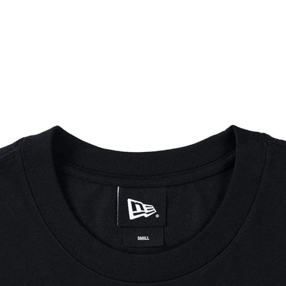 The model is wearing this New Era Skate Is Life Graphic Oversized T-Shirt in black. 4