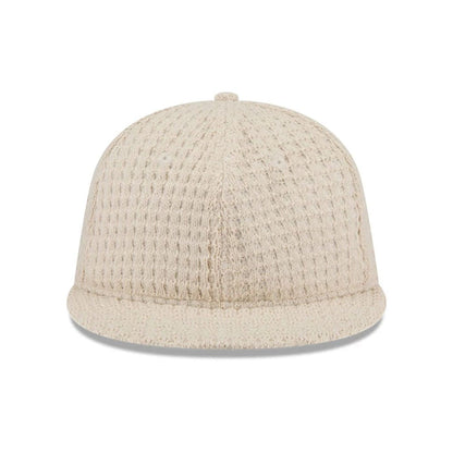 This is a  New Era Waffle Knit Light Beige Retro Crown 9FIFTY Adjustable Cap 3