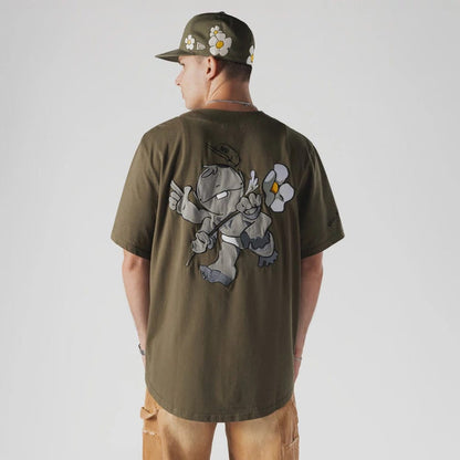 The Male model is wearing  New Era x Rodrigo Roji Flower Green Jersey 2