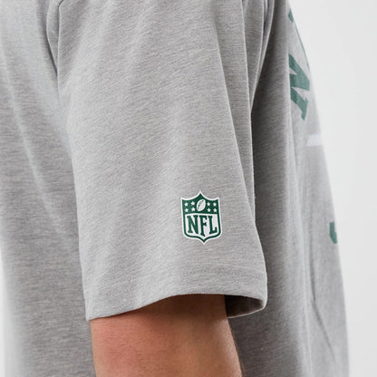 The Male model is wearing New York Jets NFL International Series Games Grey Oversized T-Shirt 6