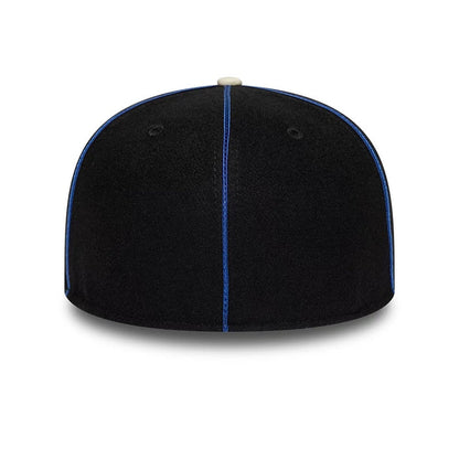 Pictured is this NBA Felt Logo New York Knicks Retro Crown 59FIFTY Fitted cap in dark blue. 7