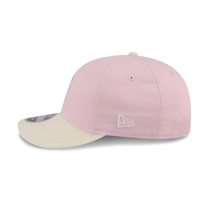 Pictured is this MLB Washed Tie Dye New York Yankees 9FIFTY Snapback cap in pastel pink. 5