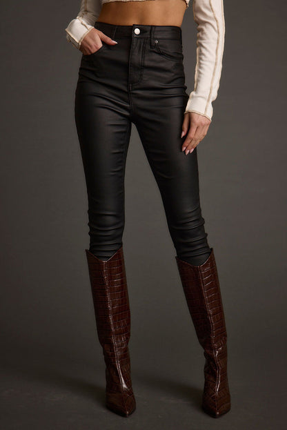 Nixon Black Coated Pants styled in a complete look from an alternate angle.