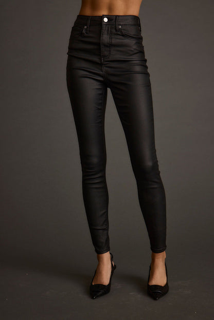 Nixon Black Coated Pants paired with complementary accessories for a polished look.