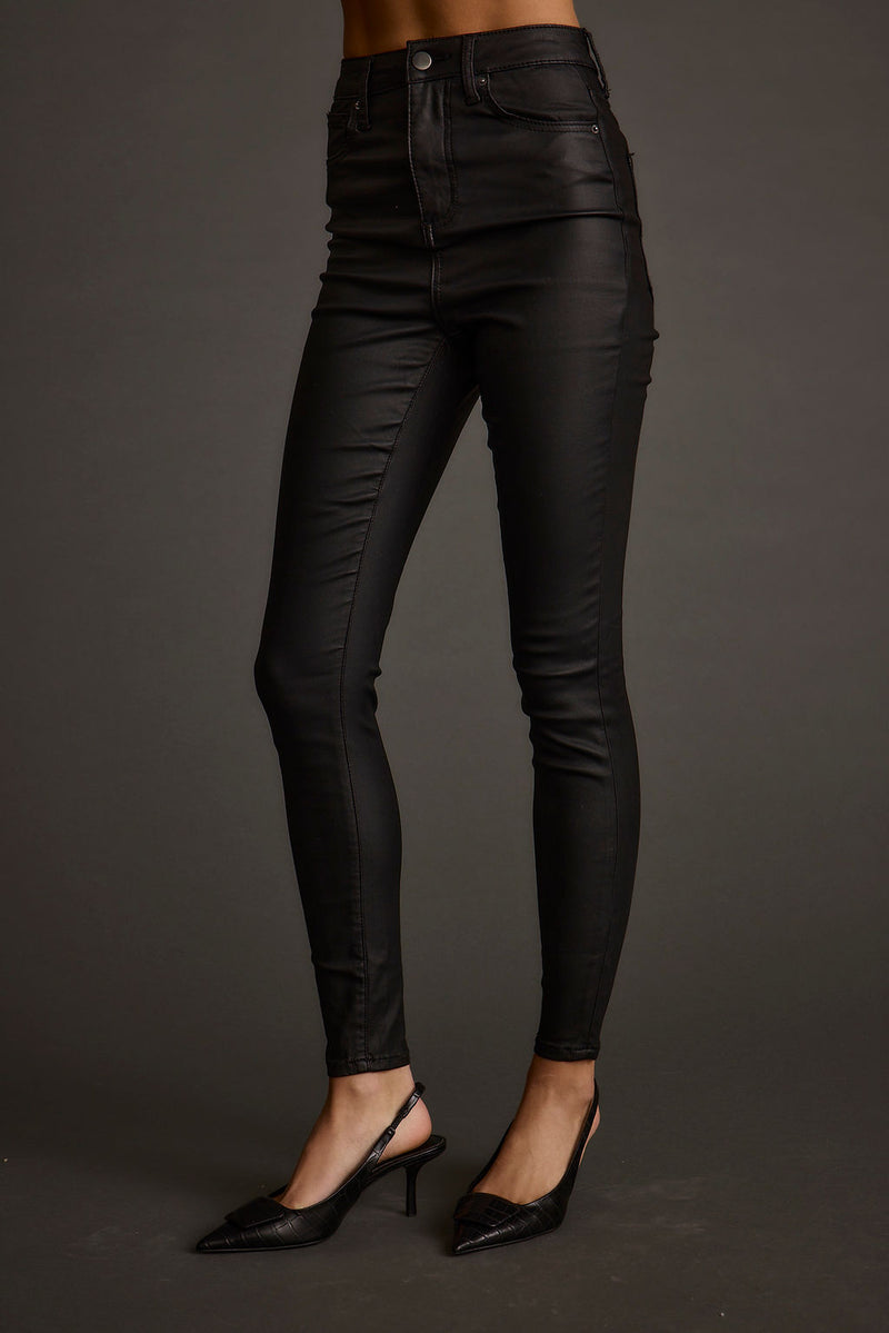 Detail shot of the Nixon Black Coated Pants highlighting the design elements.