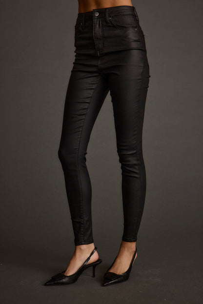 Detail shot of the Nixon Black Coated Pants highlighting the design elements.