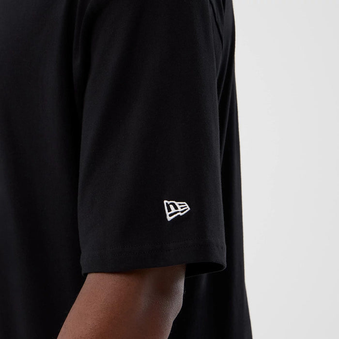 The Male model is wearing Pittsburgh Steelers NFL International Series Games Black Oversized T-Shirt 6