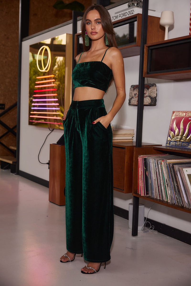 Rhea Emerald Velvet Crop Top paired with complementary accessories for a polished look.
