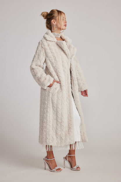 Close-up of the Sasha Cream Floor Length Coat showcasing the fabric texture and design details.
